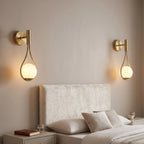 applique murale dorée globe opalin lumière douce chambre — Alenza