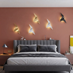 applique murale LED oiseau lumière indirecte finition dorée — Alenza